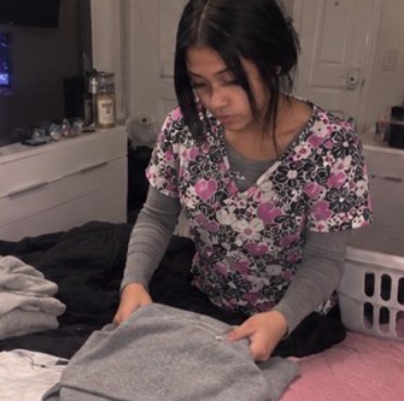 Jen folding clothes